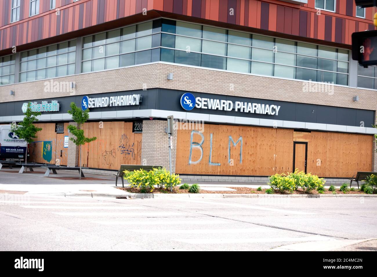 Seward Pharmacy on Lake Street BLM on boarded up windows. Minneapolis Minnesota MN USA Stock Photo