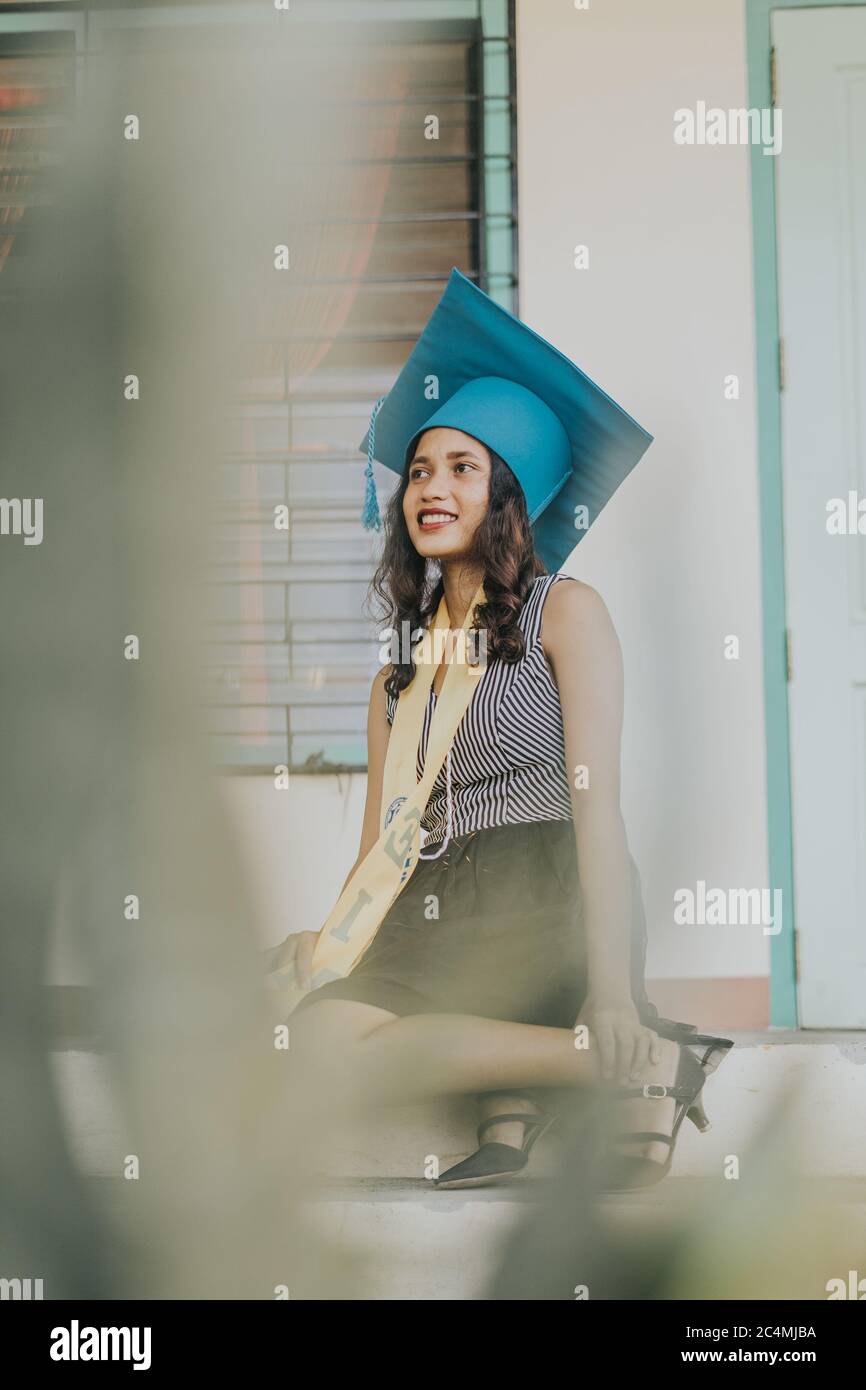 A woman wearing a graduation gown and a sash photo  Free Sonoma state  university Image on Unsplash