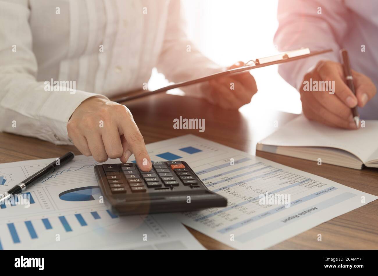 Auditor team examine data in the financial statement to the financial results of the company. Accounting, Internal audit concept. Stock Photo