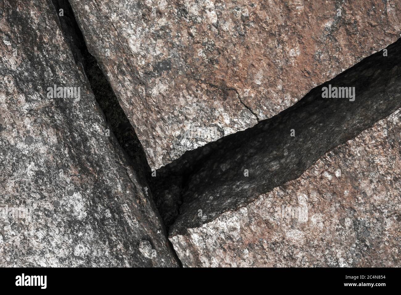 One precise sharp crack on bedrock surface , Finland Stock Photo