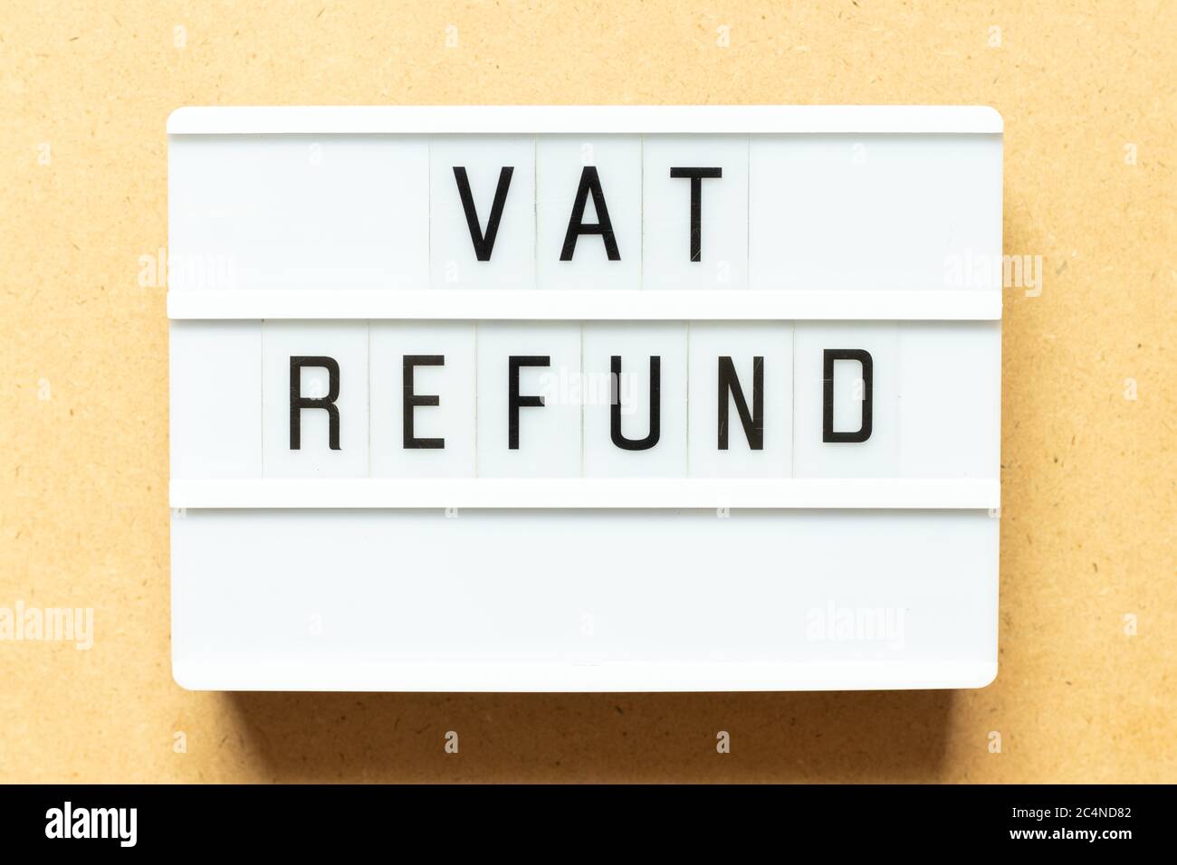Lightbox with word vat refund on wood background Stock Photo