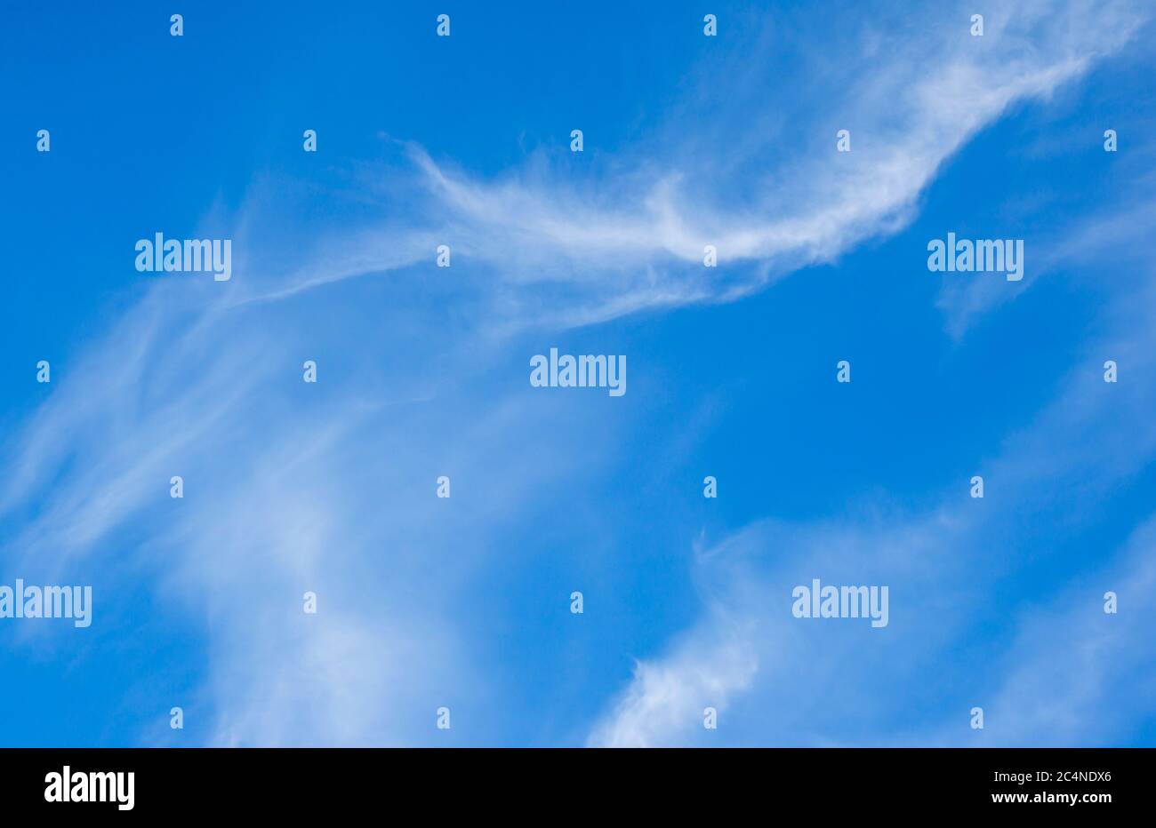 Soft bodiless white clouds on blue sky , Finland Stock Photo