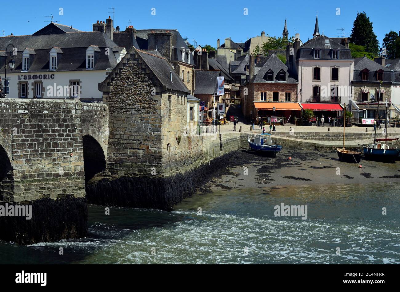 Auray, France - June 08, 2011: Unidentified people on medieval villageon river loch in Morbihan county Stock Photo