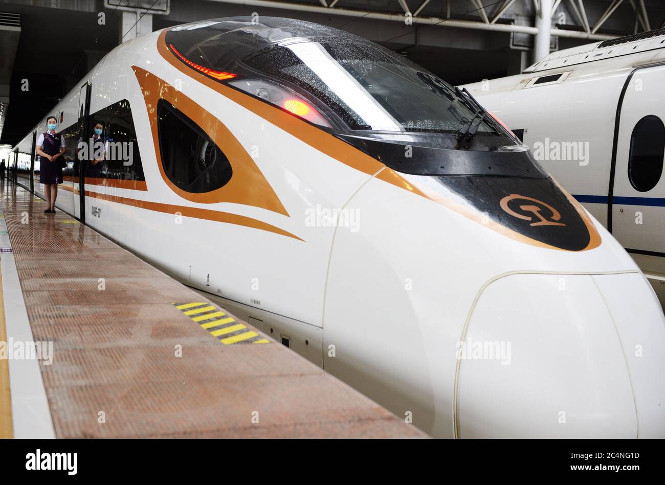Hefei. 28th June, 2020. Photo taken on June 28, 2020 shows train No. G9394, which travels from Hefei to Hangzhou on the Shangqiu-Hefei-Hangzhou high-speed railway, before departure at Hefei South Railway Station in Hefei, east China's Anhui Province. A new high-speed railway route connecting east and central China started operation on Sunday. With a designed speed of 350 kph, the route connects the city of Shangqiu in central China's Henan Province, and Hefei and Hangzhou, the capital cities of east China's Anhui and Zhejiang provinces. Credit: Huang Bohan/Xinhua/Alamy Live News Stock Photo