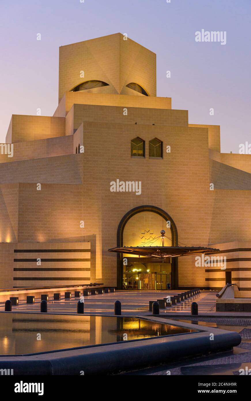 Sunset over the landmark Museum of Islamic Art, Doha, Qatar Stock Photo
