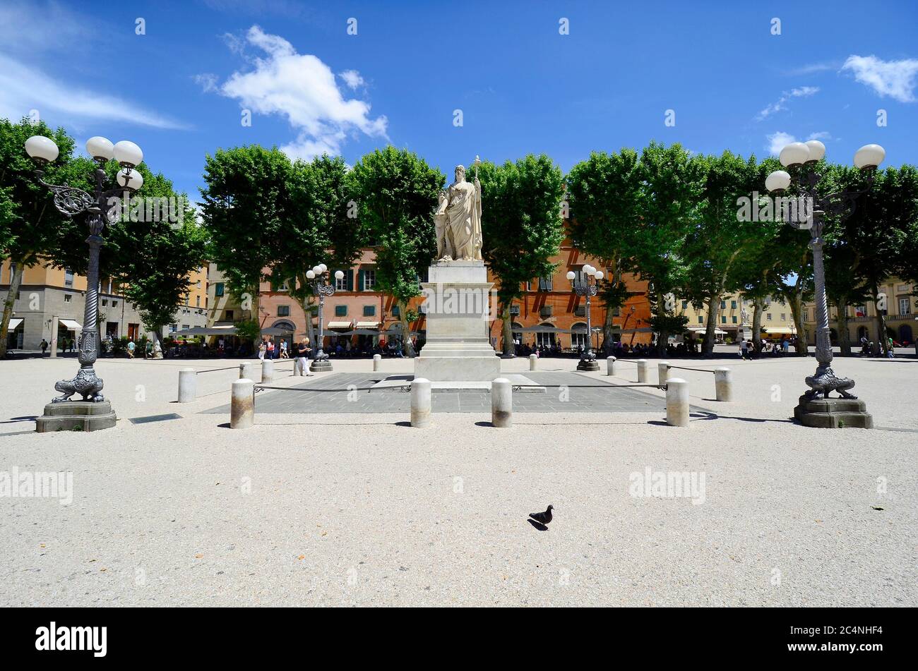 Lucca, Italy - June 11, 2012: Unidentified people and monument on Piazza Napoleone, one of the biggest squares in Lucca. It was designed by the sister Stock Photo