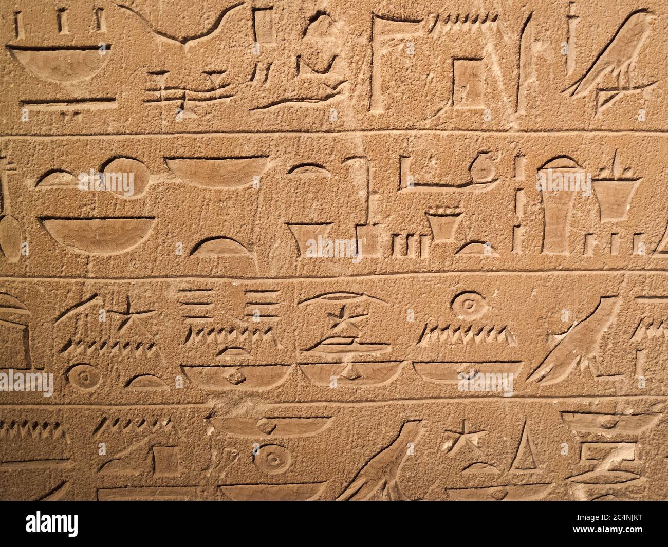 Ancient Egypt tomb hieroglyphs stone wall background Stock Photo - Alamy
