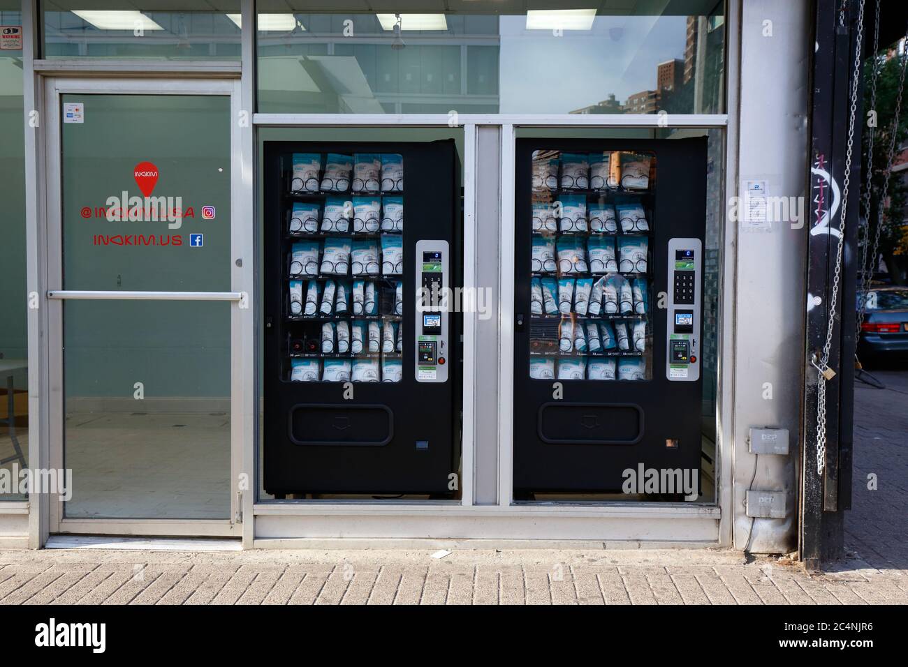 Vending machines containing KN95 respirator face masks operated by RapidMask2GO in a Manhattan storefront in New York City. Stock Photo