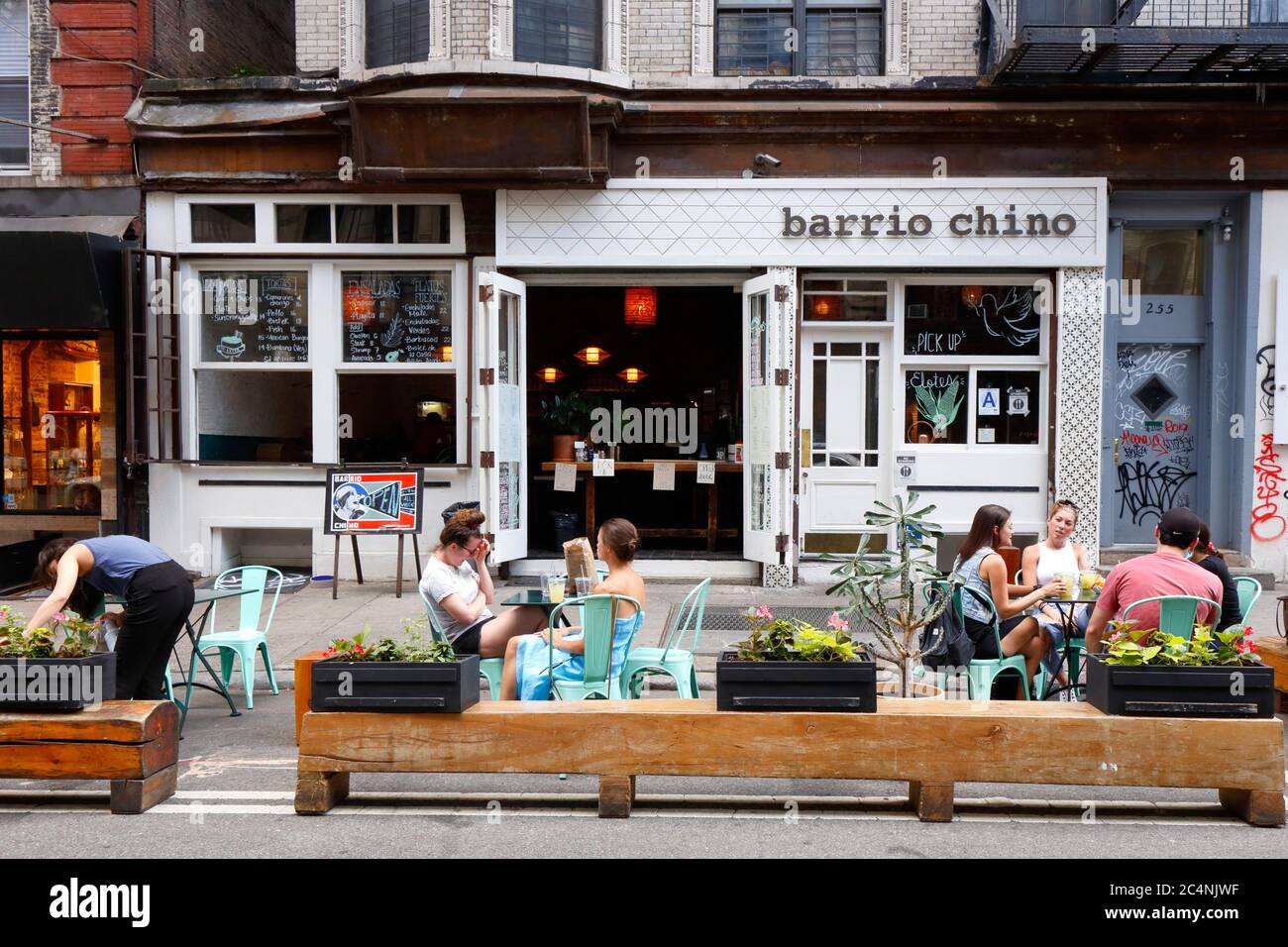 Barrio Chino, 253 Broome St, New York, NYC storefront photo of a trendy Mexican restaurant in the Lower East Side neighborhood of Manhattan. Stock Photo
