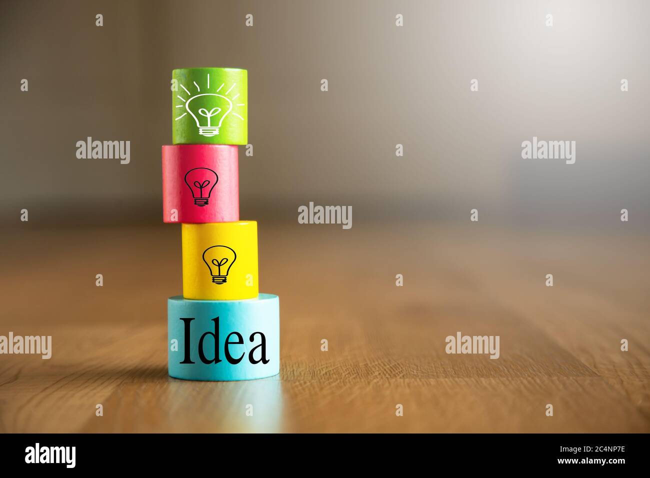 Wooden cubes block with light bulb icon and idea text Stock Photo - Alamy