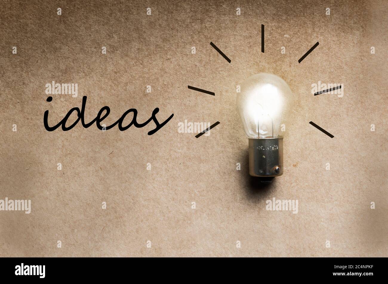 Bright idea and insight concept with isolated light bulb Stock Photo