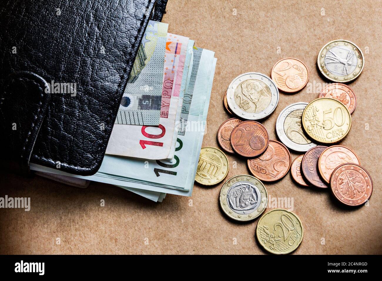 Concept of Personal Finance control with wallet and banknotes coins Stock Photo