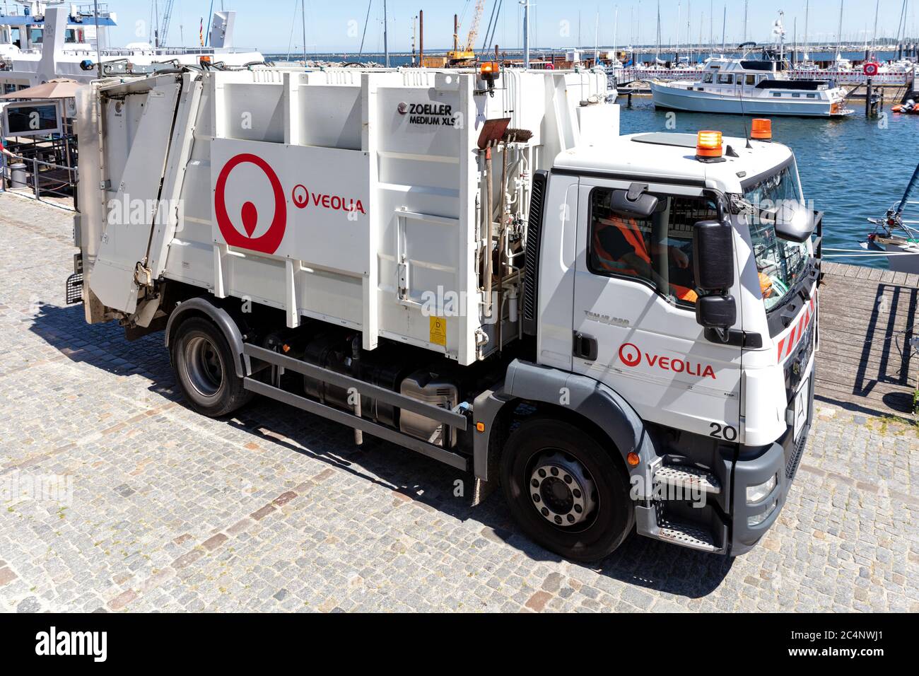 Veolia dustcart. Veolia is a French transnational company with activities in water management, waste management and energy services. Stock Photo