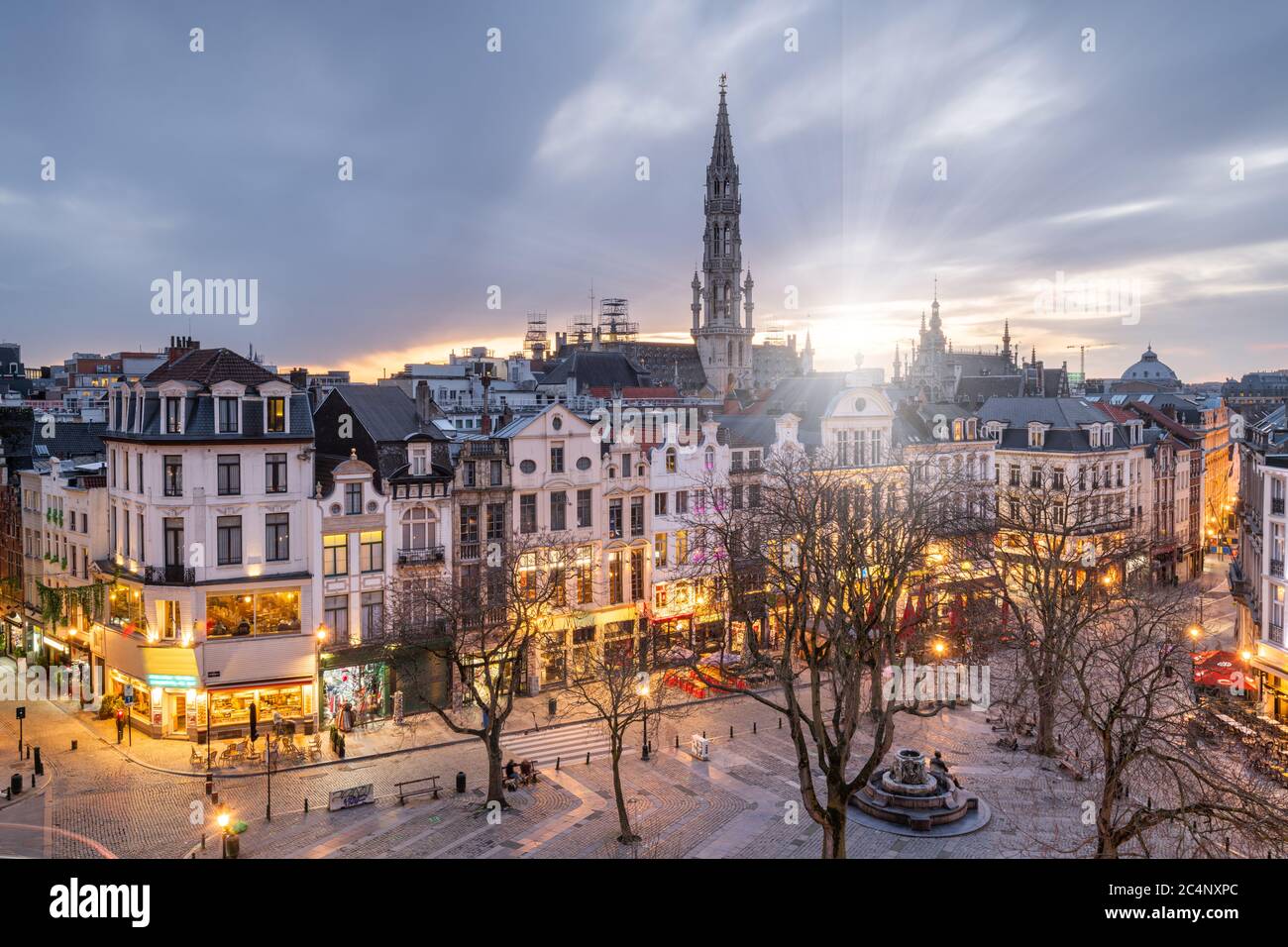 Brussels, Belgium plaza and skyline with the Town Hall tower at dusk. Stock Photo