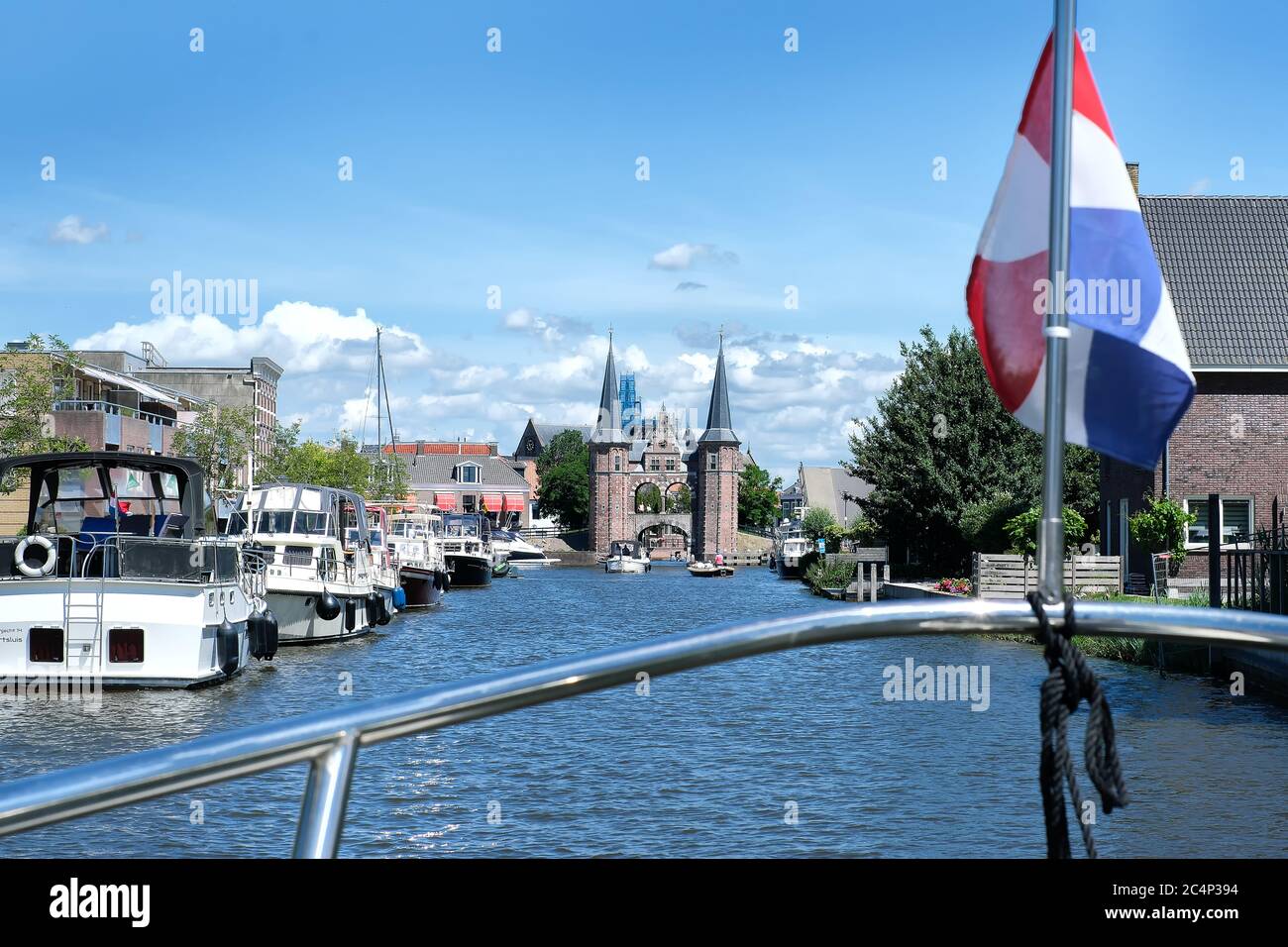 Europe, Netherlands - Tour over the canals of Friesland, the water gate of Sneek, view from the boat Stock Photo