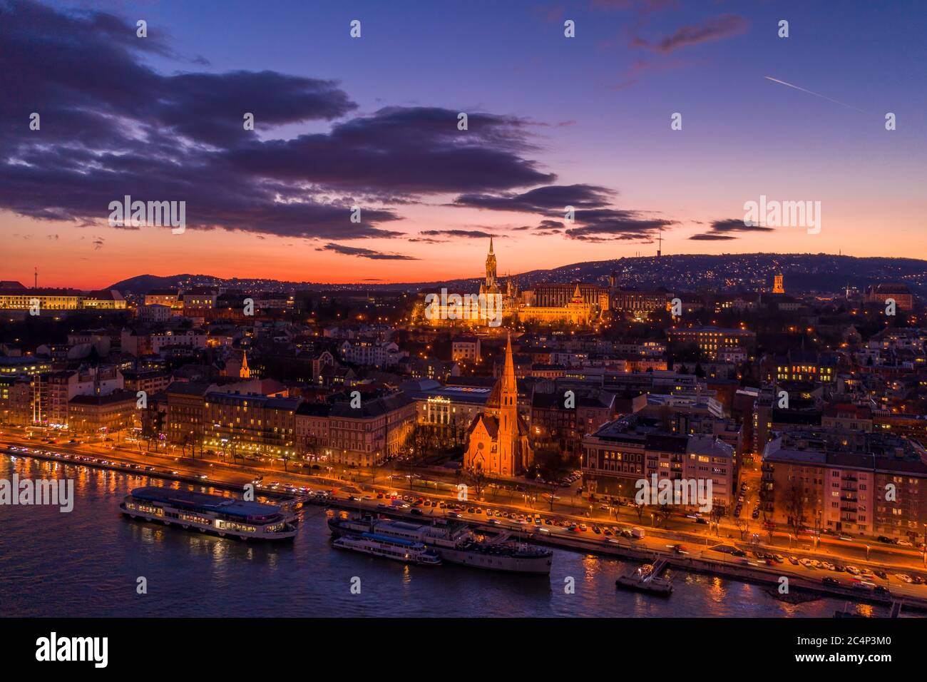 Aerial drone of lighted Matthias Church on Buda hill during Budapest ...