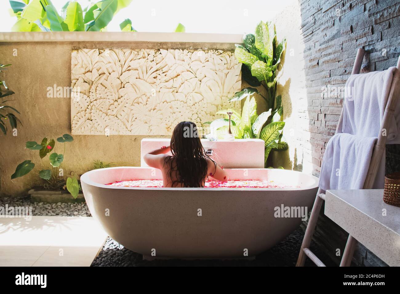 Woman lying in bath tub hi-res stock photography and images - Alamy