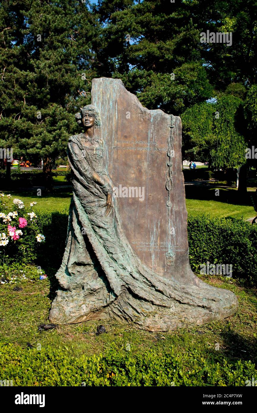 Como, Lombardy, Italy. Lake of Como. Monument to Mafalda of Savoy (Mafalda di Savoia).. In the gardens, overlooking Lake Como, a bronze statue commemorates Princess Mafalda of Savoy who died on August 28, 1944 in the Buchenwald concentration camp. The work was created by Massimo Clerici in 2002. Stock Photo
