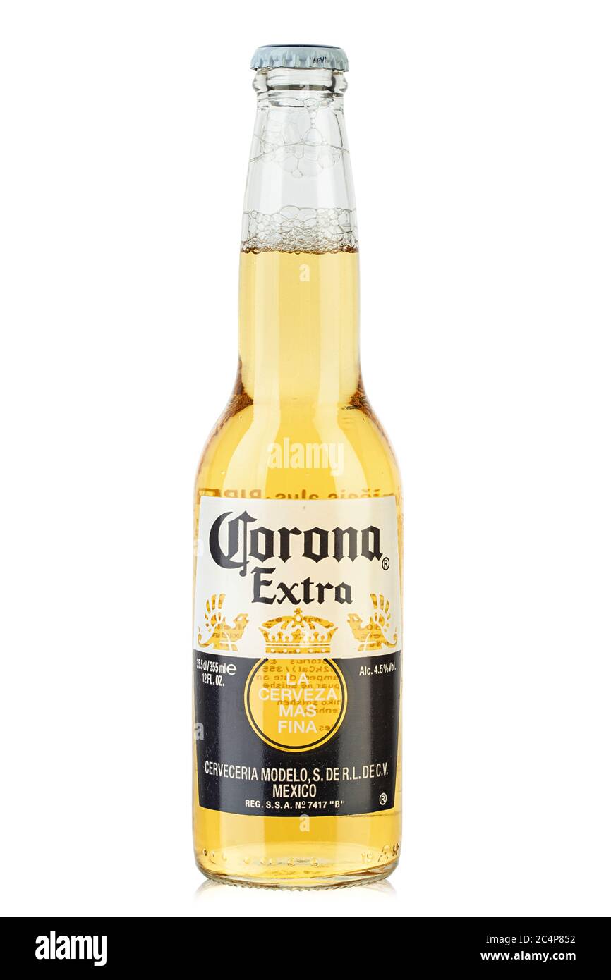 Ukraine, Kyiv - June 03, 2020: Photo of Corona Extra Beer bottle   isolated on white background. Corona Extra is produced in Mexico. File contains cli Stock Photo