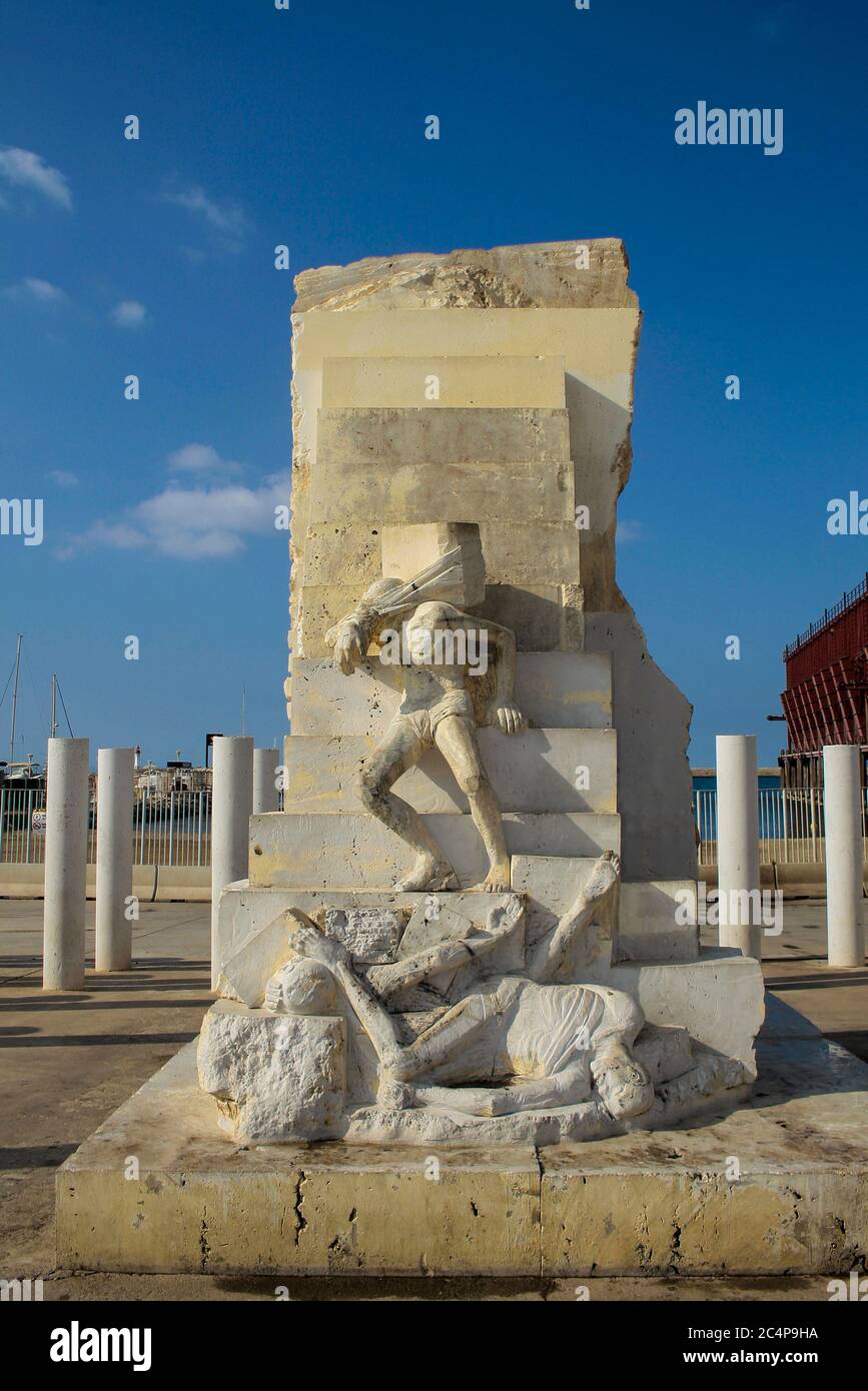 Almería, Andalusia, Spain, Europe.. Plaza de la Constitucion or Plaza Vieja. Monument to the Martyrs of Liberty (Martires de la libertad), also known as the monument to the Coloraos or Pingurucho, is a commemorative column inaugurated in 1870 and restored in 1988. Stock Photo