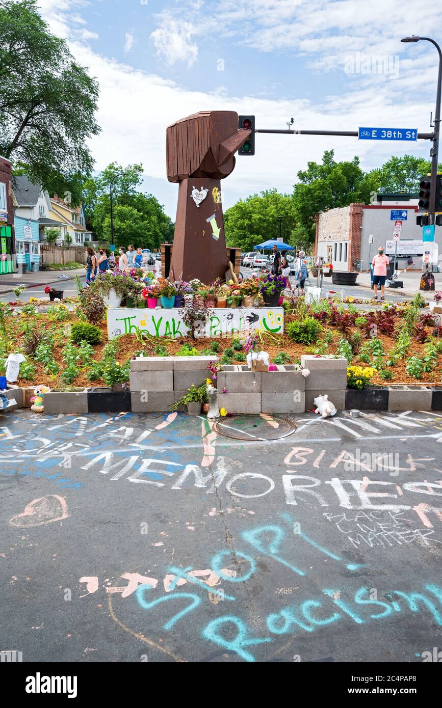 Minneapolis, MN/USA - June 21, 2020: Raised fist memorial on street corner site of George Floyd’s arrest and death. Stock Photo