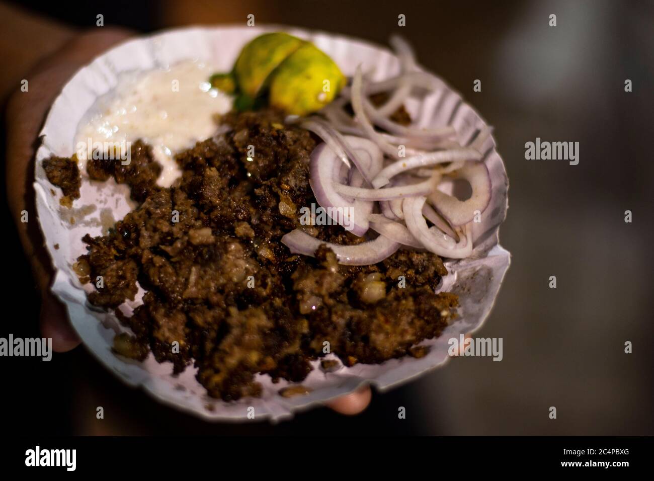 Sutli Kebab Being Served In Paper Plate Stock Photo