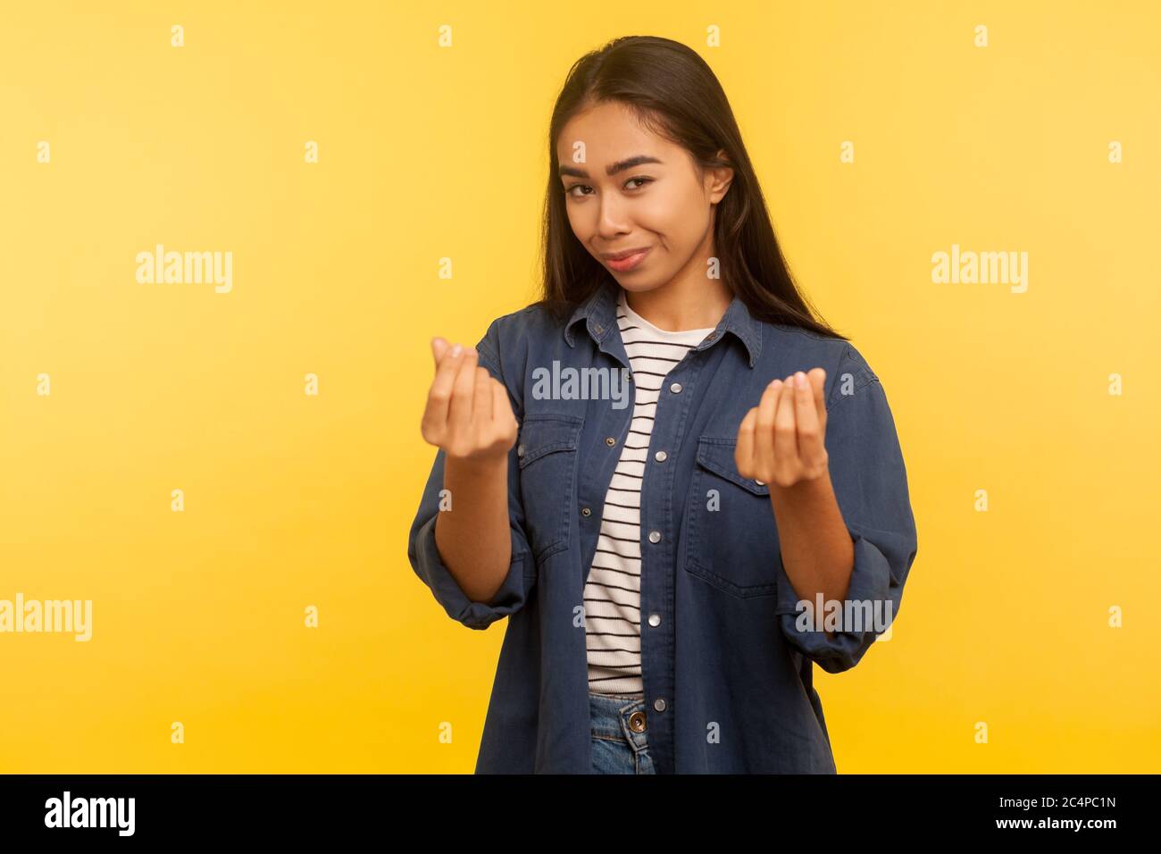 Using Greedy Girl Portrait of greedy girl in denim shirt showing money gesture and ...