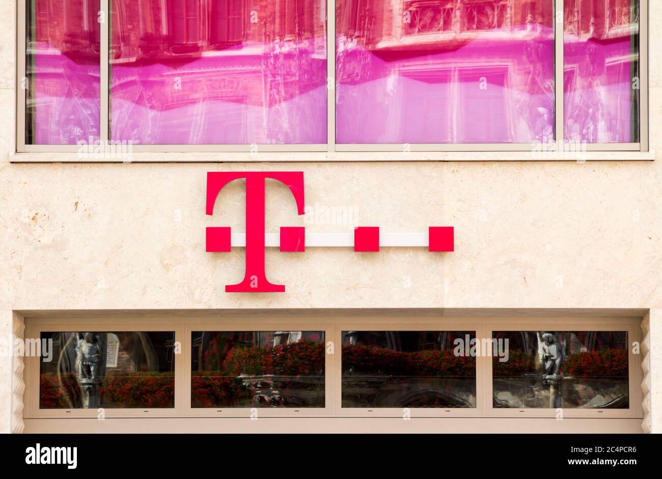 Munich, GERMANY : Emblem T-Mobile. T-Mobile International AG is a holding company for Deutsche Telekom AG's various mobile communications subsidiaries Stock Photo