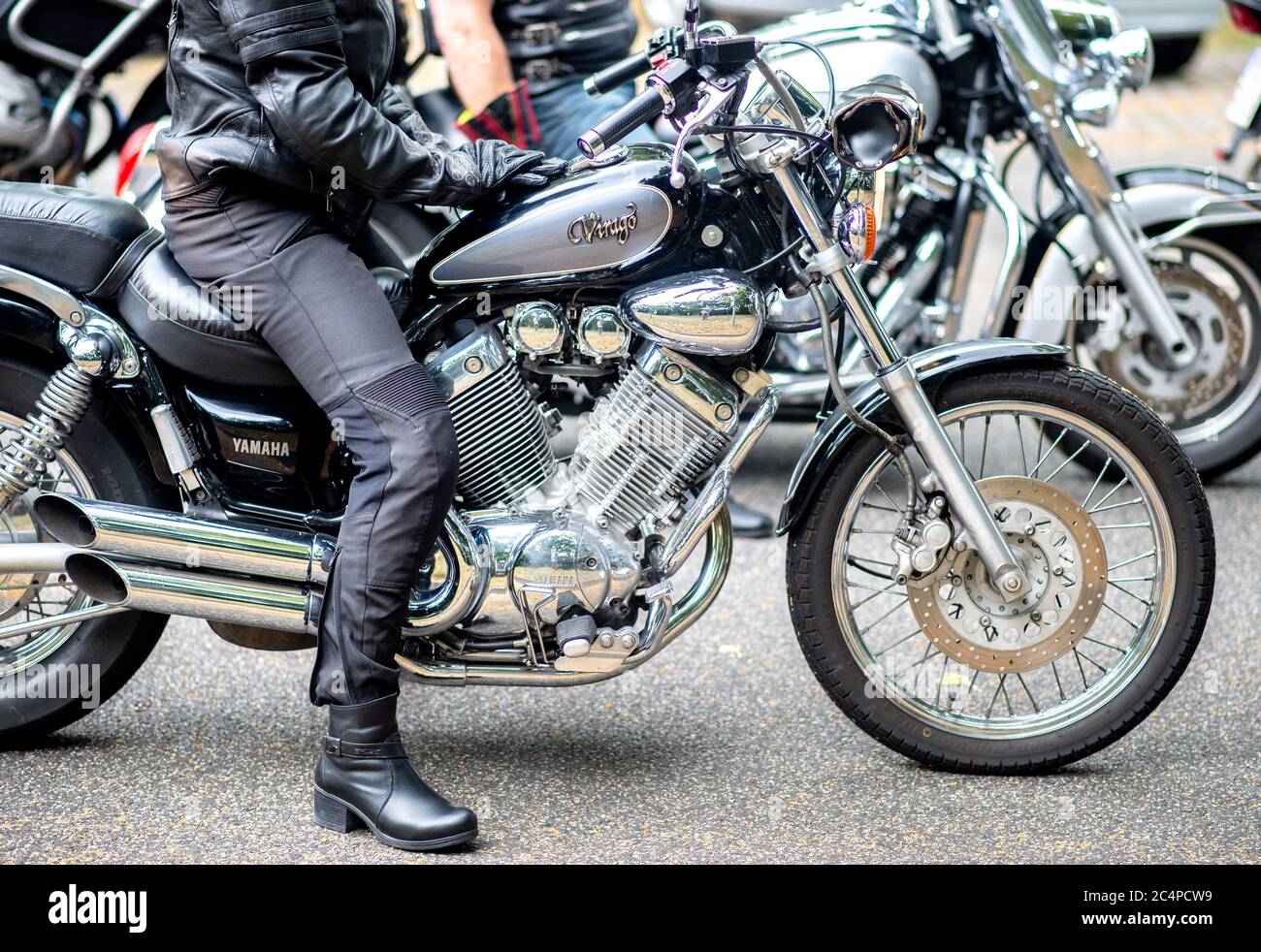 Hanover, Germany. 28th June, 2020. A woman is riding her Yamaha motorcycle during a demonstration ride on the Rudolf-von-Bennigsen bank. With the ride from Hildesheim to Hannover, the motorcyclists want to protest against stricter laws. The background are proposals of the Bundesrat to avoid noise. Credit: Hauke-Christian Dittrich/dpa/Alamy Live News Stock Photo