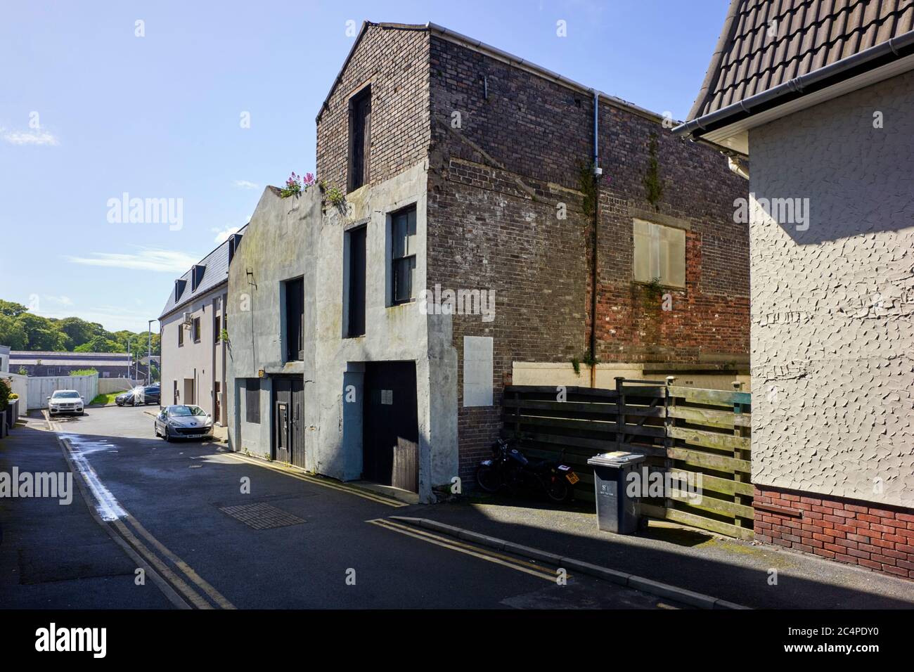 Registered warehouse building in danger of being demolished in Lake Road, Douglas, Isle of Man Stock Photo