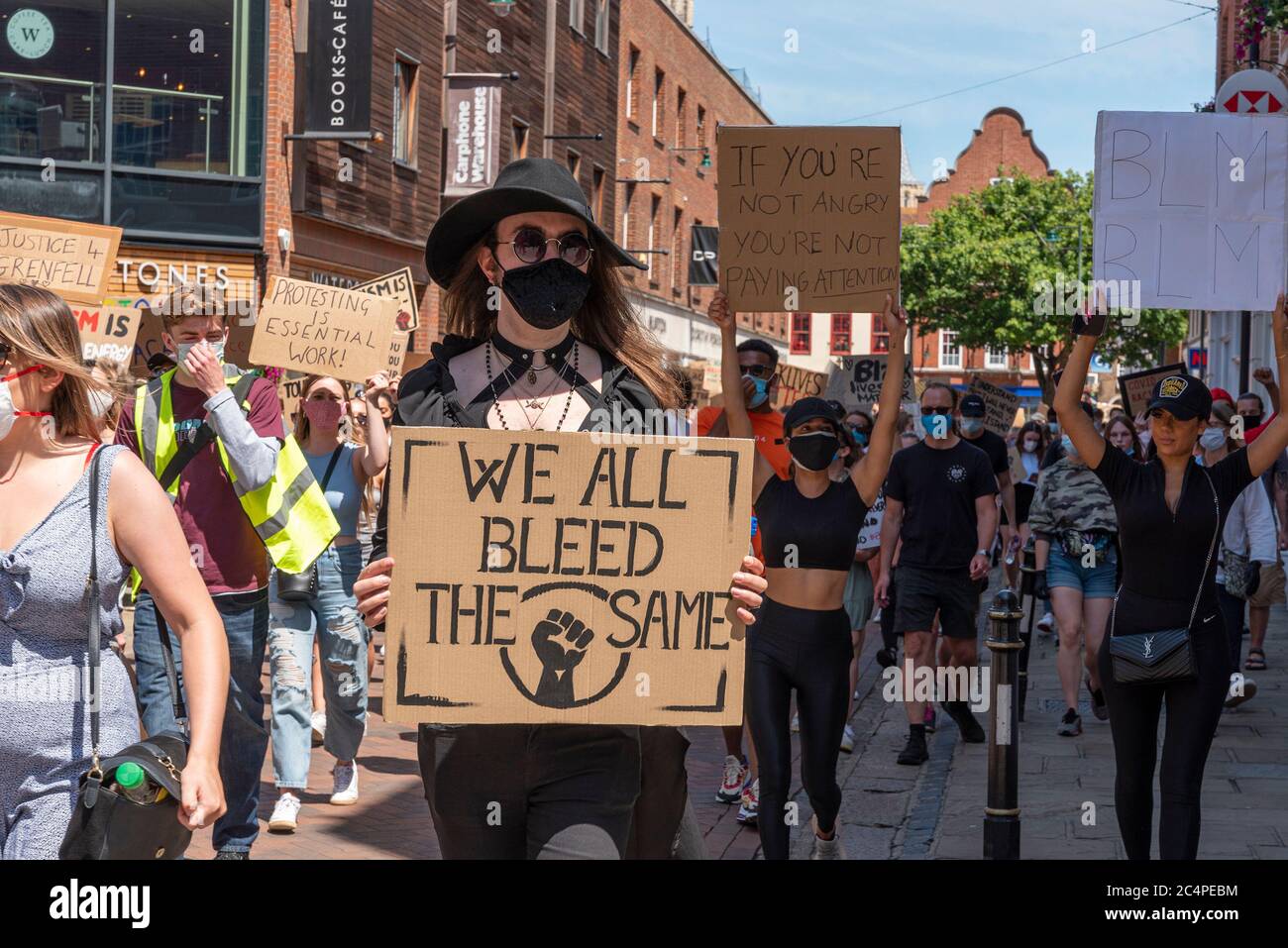 The BLM  protestors march through the city's streets Stock Photo