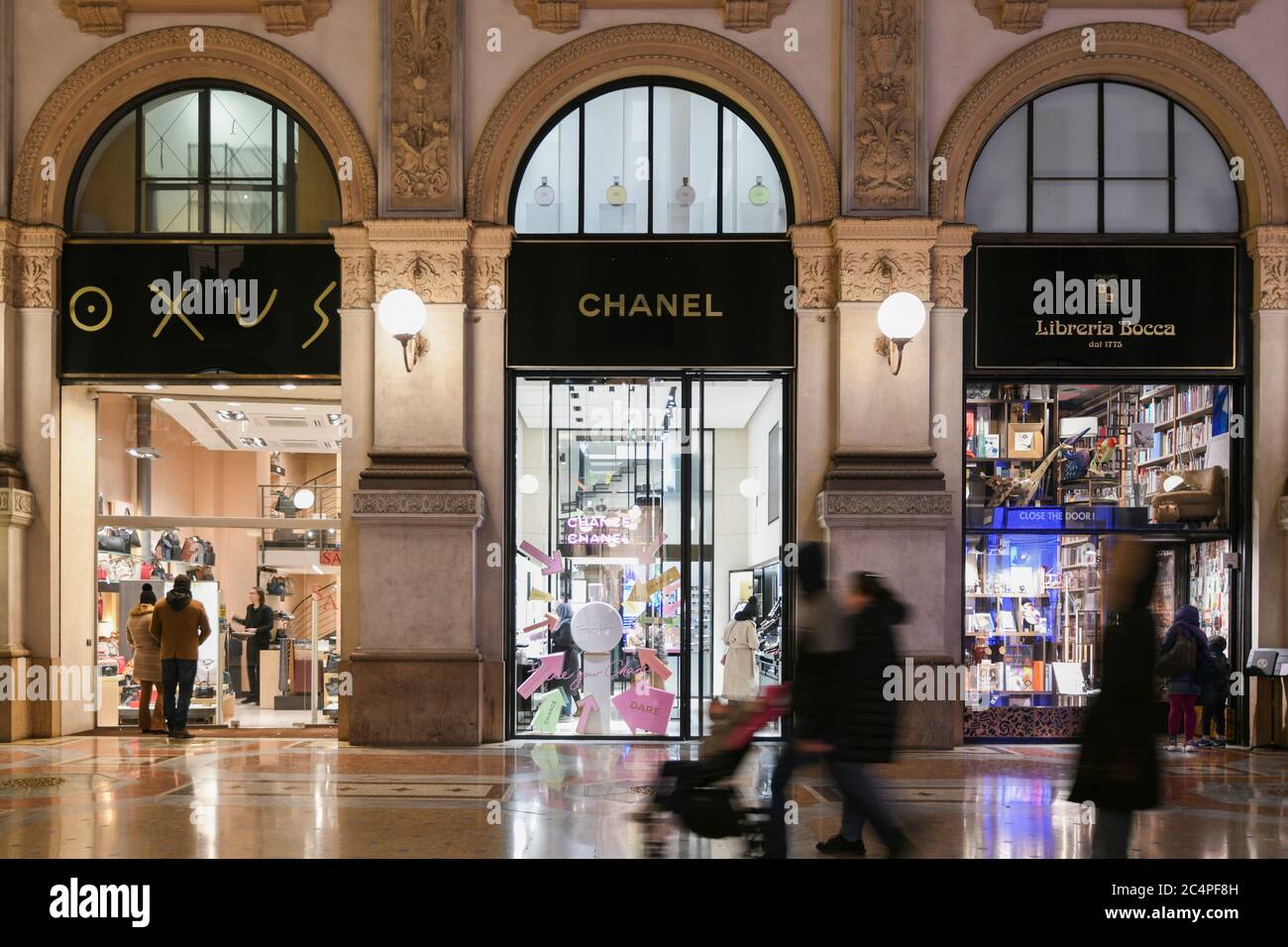 Milan, Italy - January 13, 2020: Chanel lighted showcases at night Stock Photo