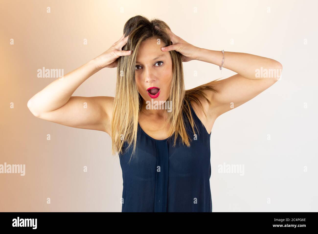 Woman in a blue shirt hi-res stock photography and images - Alamy
