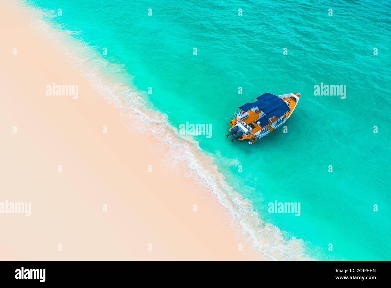 Beautiful carribean sea and boat , aerial view from the beach. Stock Photo