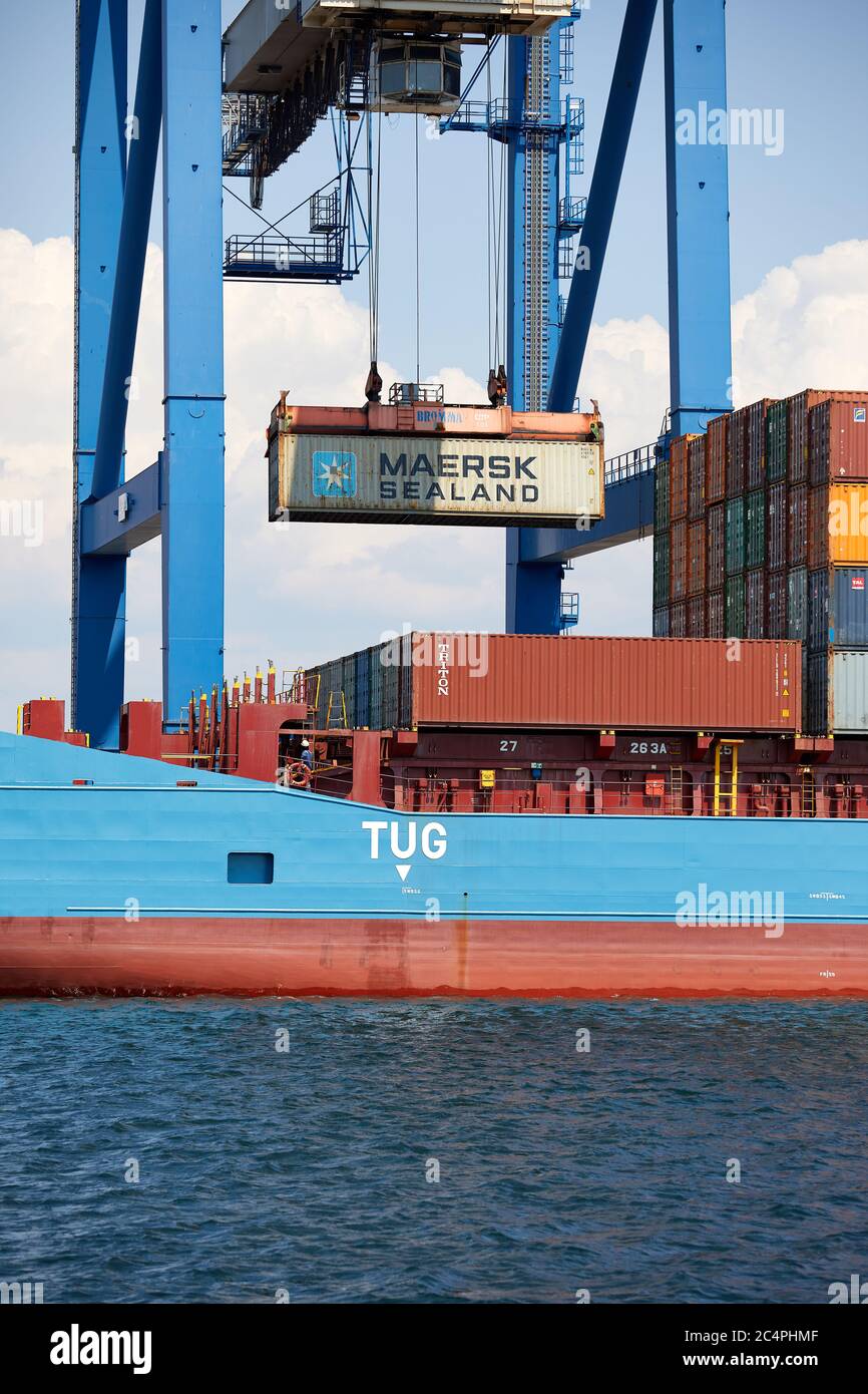 Maersk Sealand shipping container lifted by ship-to-shore crane, Copenhagen, Denmark Stock Photo