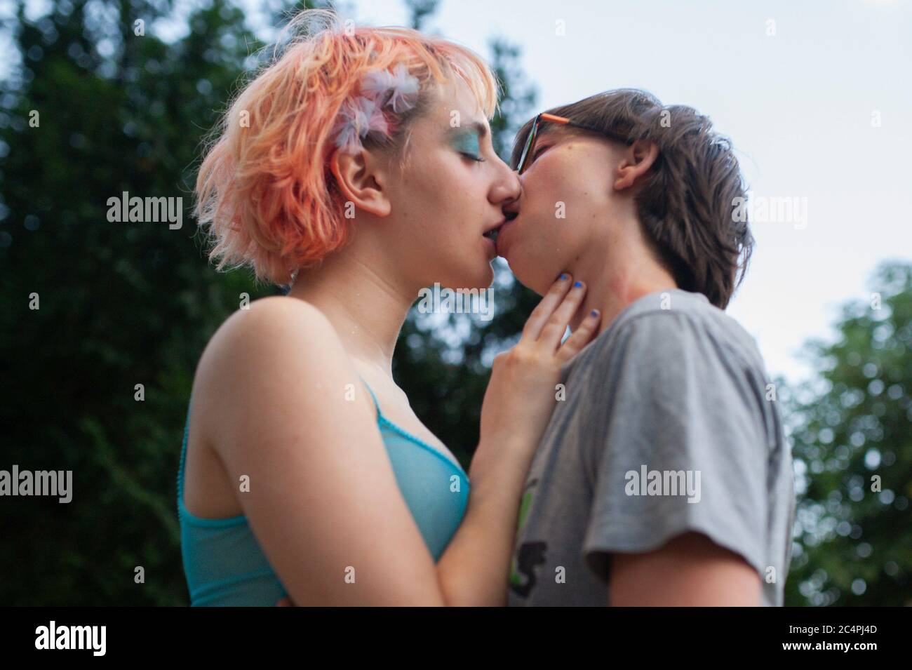 Milan, Italy. 27th June, 2020. A couple kissing during the  celebration.Despite the limitation imposed by the Covid-19 pandemic, a  small celebration for the usual Milano Pride Week took place. The LGBTQI  community