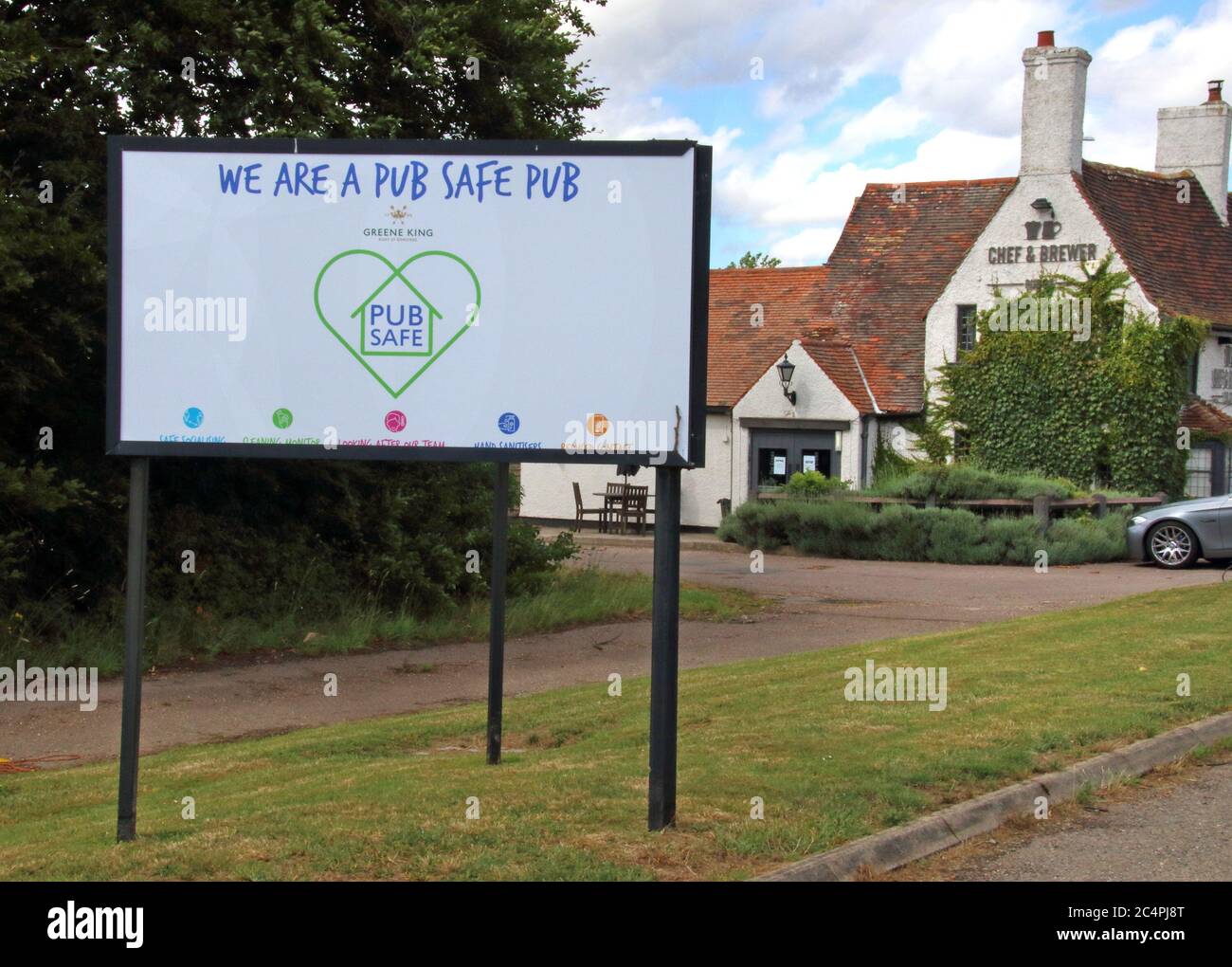 St Neots, UK. 27th June, 2020. Pub Safe scheme sign is displayed in the entrance of one of the pubs in the scheme.All Greene King's pubs will follow a new set of Pub Safe promises, ahead of their re-opening designed to care for its team members and ensure customers can socialize safely. Credit: SOPA Images Limited/Alamy Live News Stock Photo