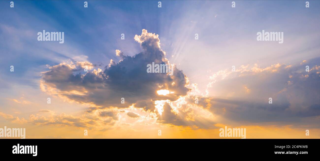Sun rays through hole in clouds hi-res stock photography and images - Alamy