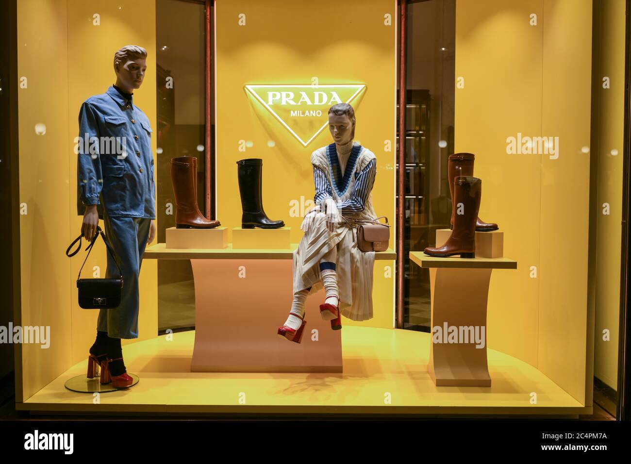 Milan, Italy - January 11, 2020: Prada clothing, boots, shoes and purses showcase Stock Photo