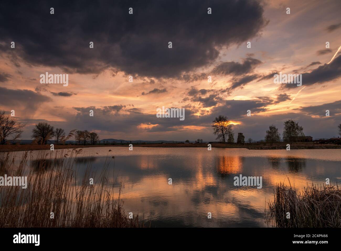 Lake cloudy sky sunset blue hi-res stock photography and images - Alamy