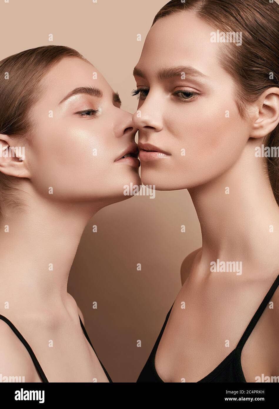 Youth girls nude Close-up studio portrait of two beautiful sensual young girls with clear  fresh young face skin and perfect nude makeup Stock Photo - Alamy