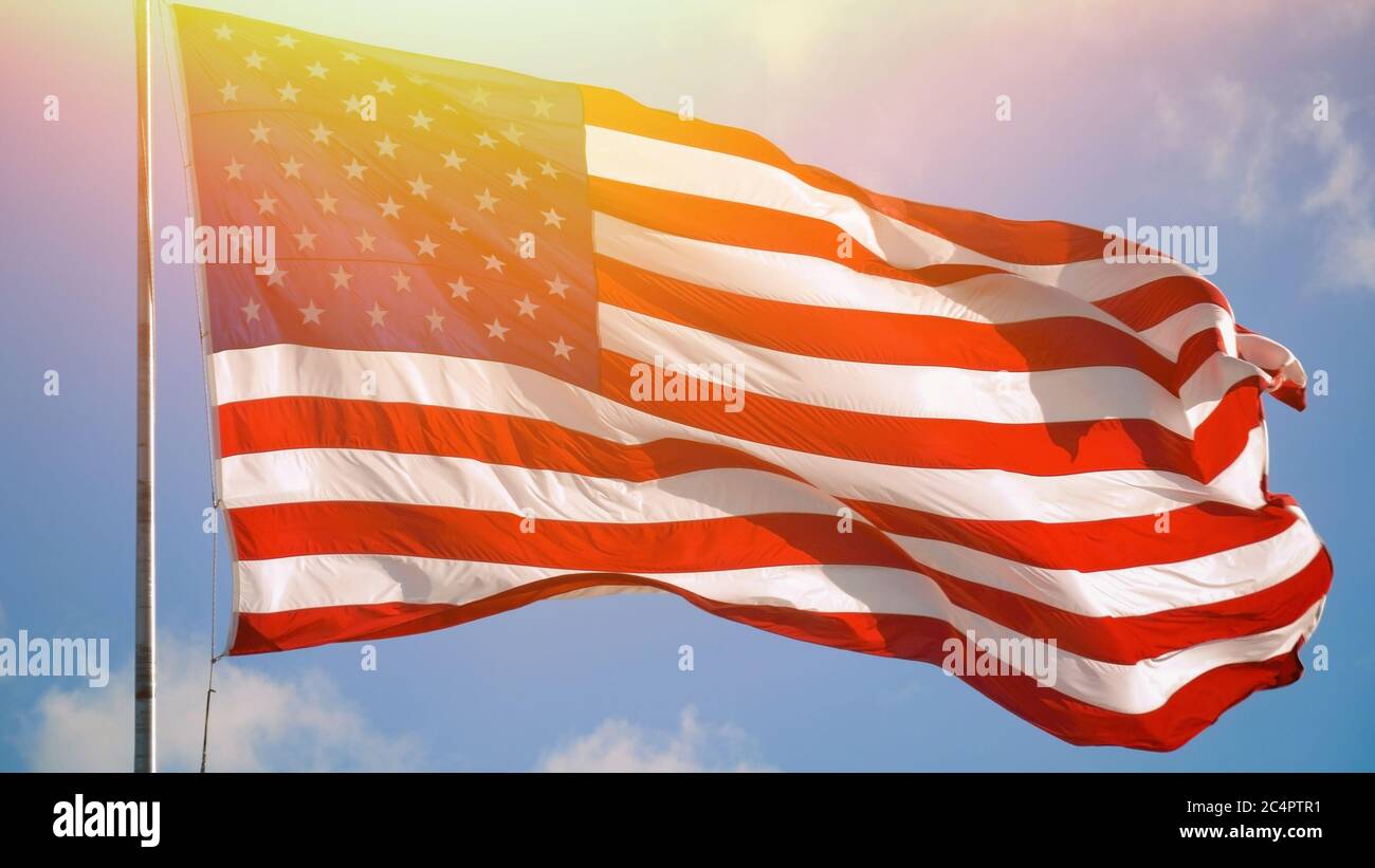 American flag USA waving in the wind. Stock Photo