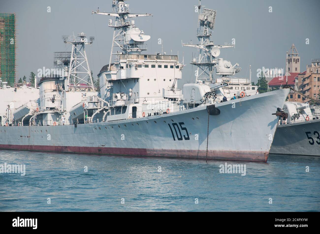 Qingdao, China.  June 25, 2016. Chinese tourists visiting retired naval ships at the Qingdao Naval Museum on Jiaozhou bay in the city of Qingdao. Stock Photo