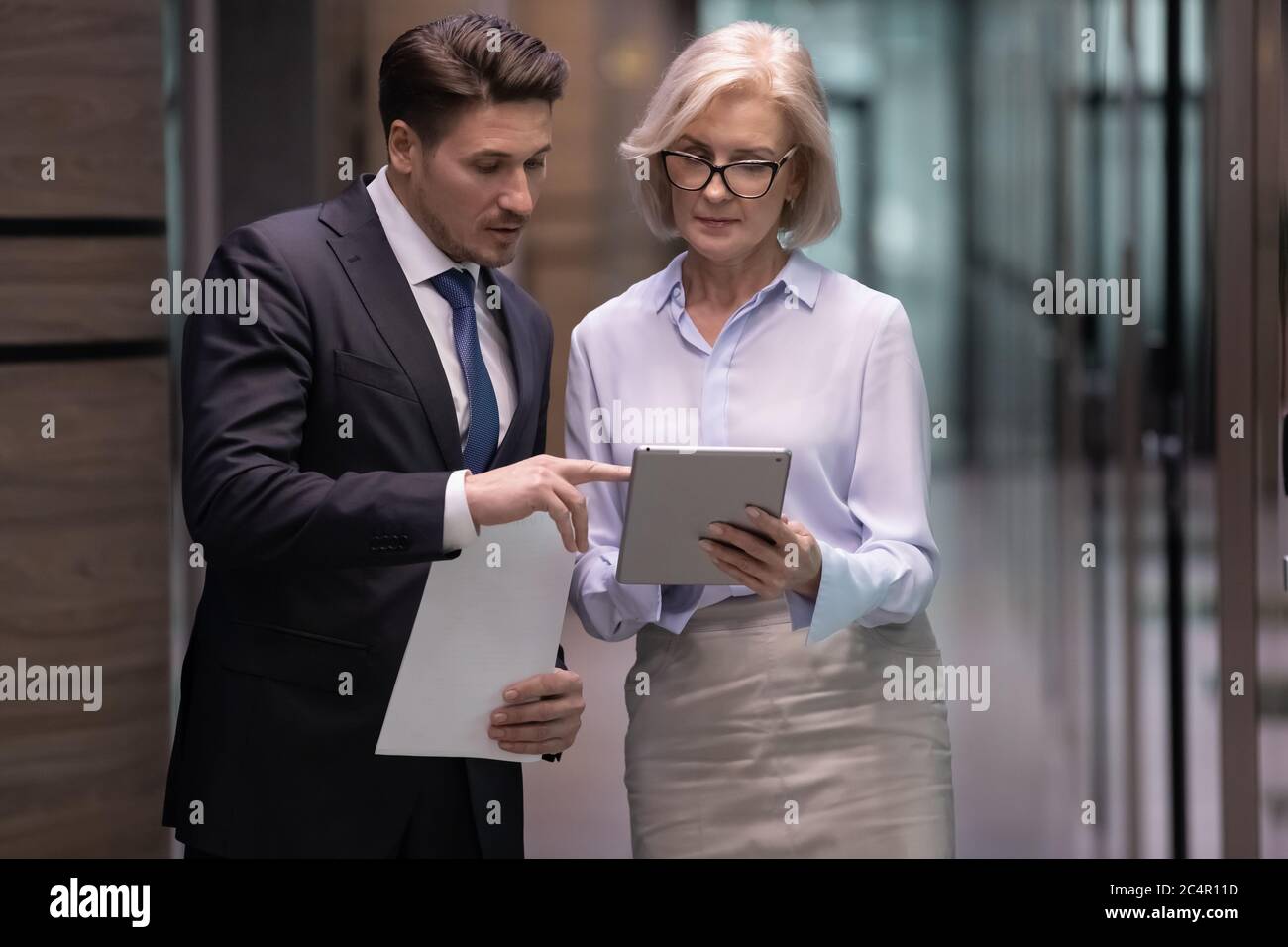 Male boss talking secretary hi-res stock photography and images - Alamy