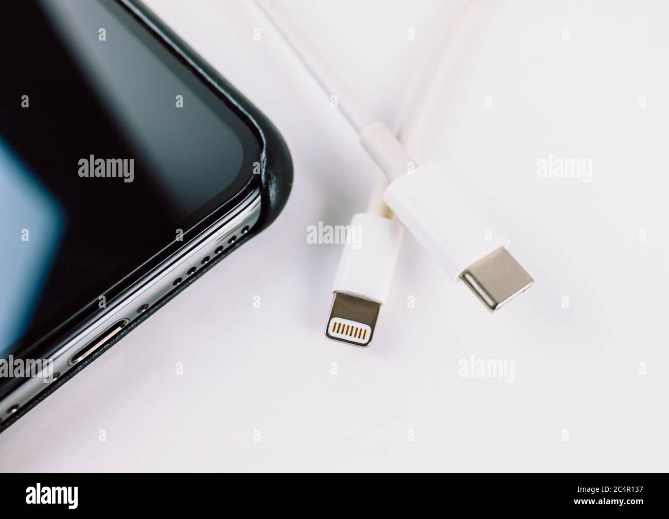 Wires with lightning and typec connectors Stock Photo Alamy