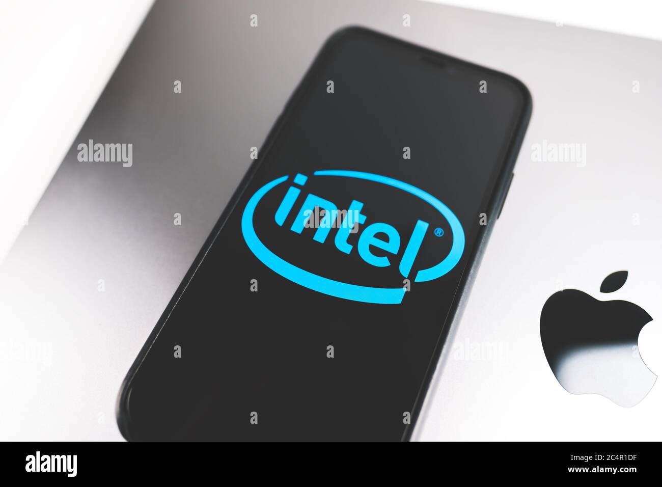 Smartphone with Intel logo on the screen. Stock Photo