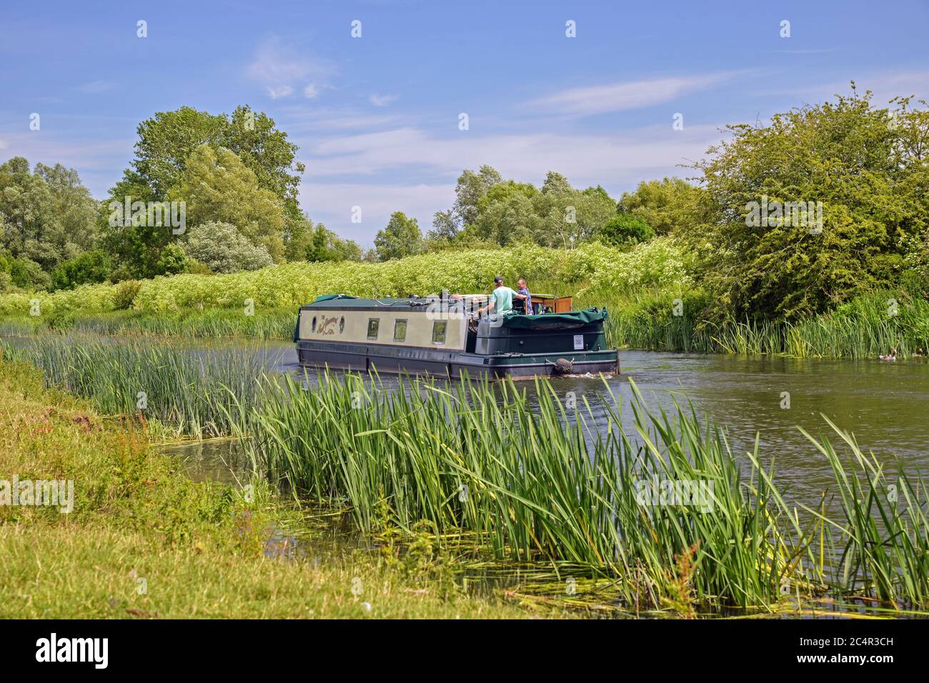 Narrow boat on the River Nene near Tichmarsh Kettering district Stock Photo