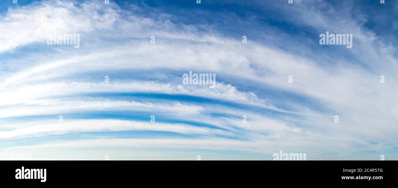 Blue sky with white clouds in a beautiful summer day Stock Photo - Alamy