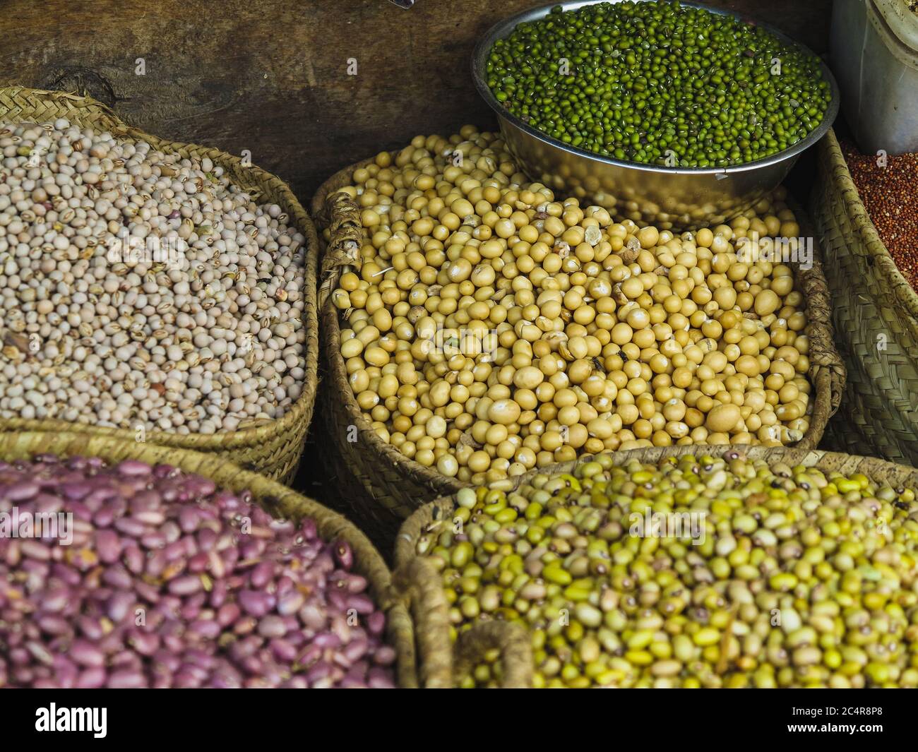 basket of beans and legumes at a food market in Stone Town, Zanzibar in Tanzania Stock Photo