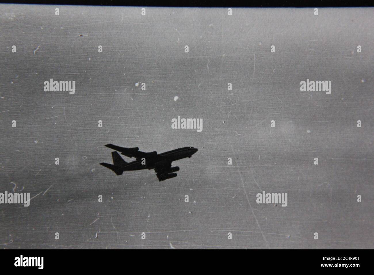 Fine 70s vintage black and white photography of a plane soaring thru ...